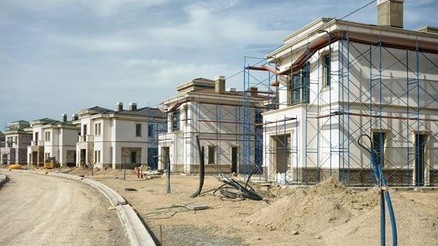A row of houses being constructed